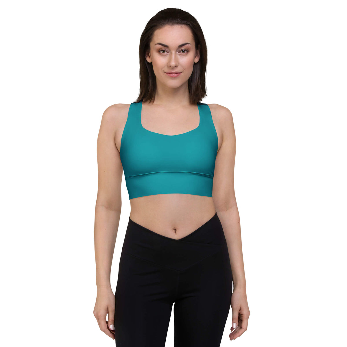 Model trägt türkisfarbenen Longline-Sport-BH mit breitem Unterbrustbund, Vorderansicht.